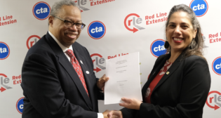 CTA President Dorval R. Carter Jr. and Federal Transit Deputy Administrator Veronica Vanterpool celebrate finalizing the $1.9 billion FFGA for the Red Line Extension Project. (CTA Photograph)